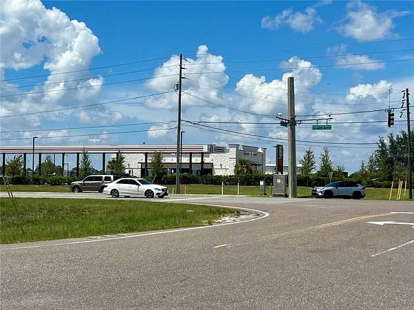 0.9 Acres of Commercial Land for Sale in Brooksville, Florida