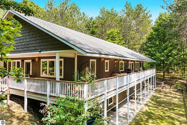 5.3 Acres of Residential Land with Home for Sale in Lake Ann, Michigan