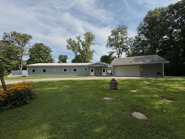 46 Acres of Recreational Land with Home for Auction in Pierceton, Indiana