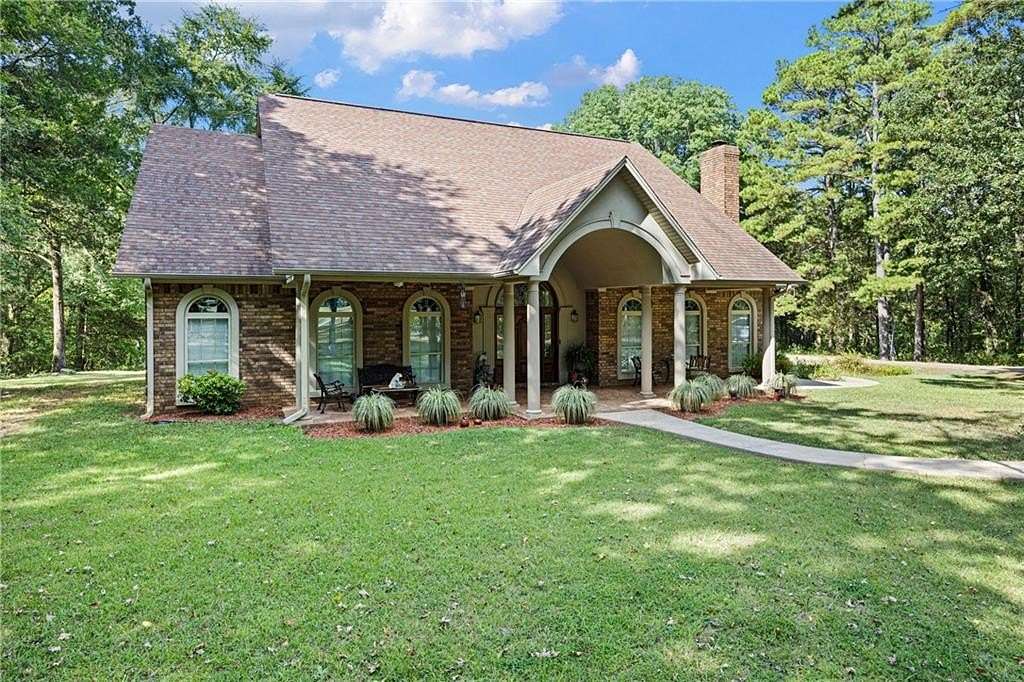 33 Acres of Land with Home for Sale in Dardanelle, Arkansas