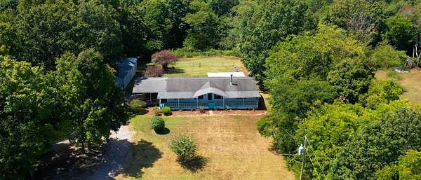 28 Acres of Land with Home for Sale in Charlotte, Tennessee