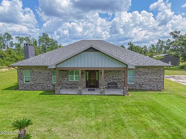 9.79 Acres of Residential Land with Home for Sale in Fountain, Florida