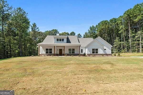 6.27 Acres of Residential Land with Home for Sale in Forsyth, Georgia