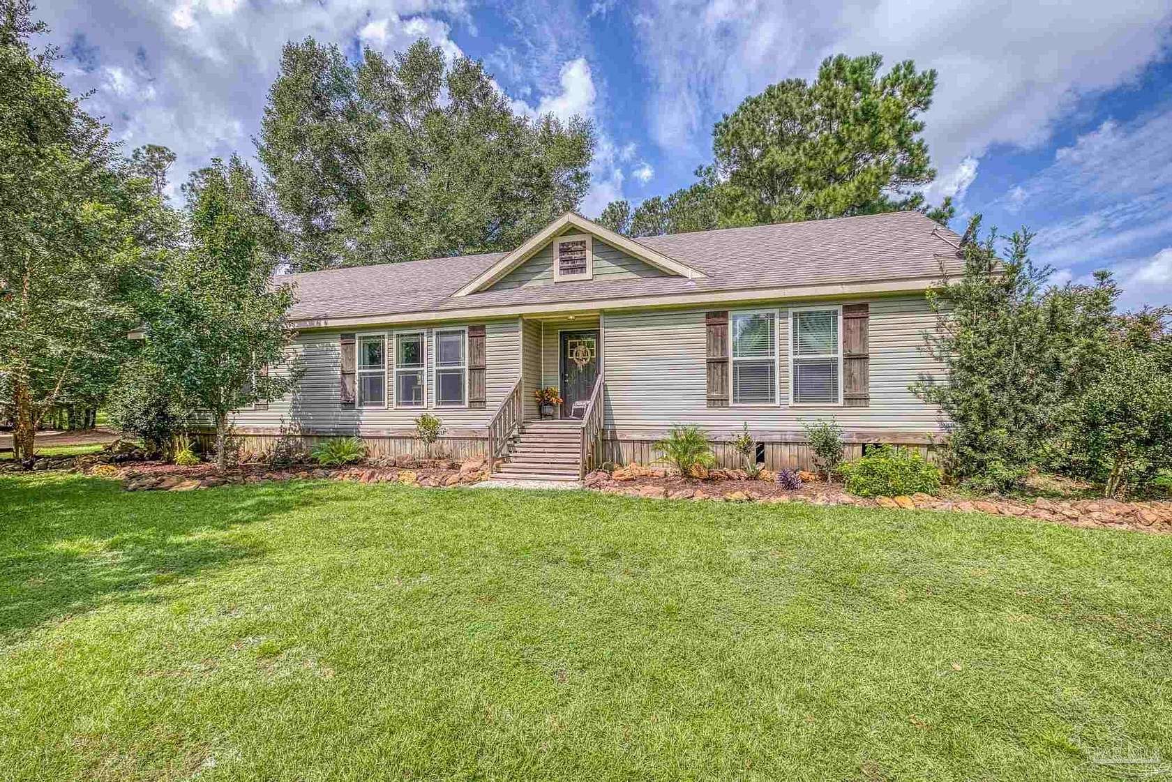 3.55 Acres of Residential Land with Home for Sale in Pace, Florida