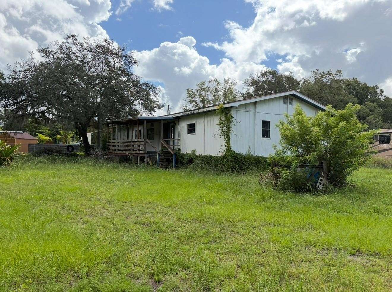 5 Acres of Residential Land with Home for Sale in St. Cloud, Florida