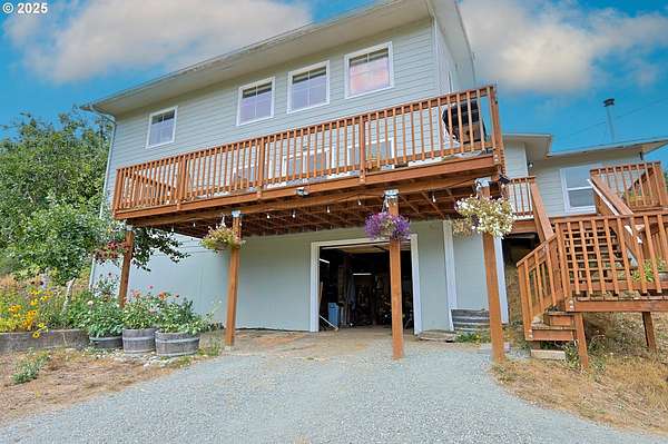 110 Acres of Agricultural Land with Home for Sale in Coquille, Oregon