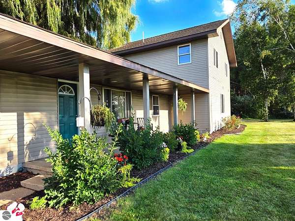 5 Acres of Residential Land with Home for Sale in Coleman, Michigan