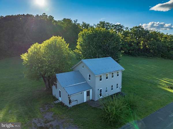10.1 Acres of Land with Home for Auction in Middleburg, Pennsylvania