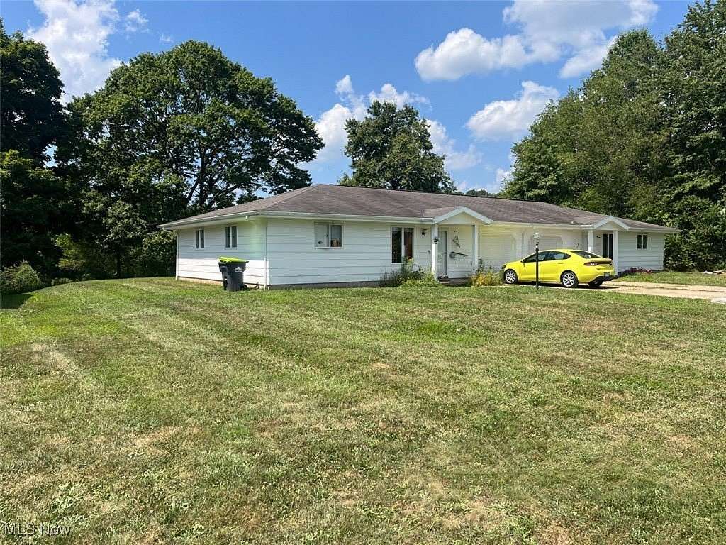 1.89 Acres of Residential Land with Home for Auction in Minerva, Ohio