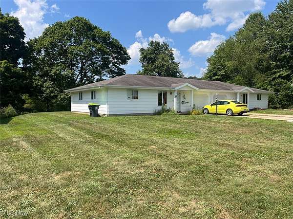 1.89 Acres of Residential Land with Home for Auction in Minerva, Ohio