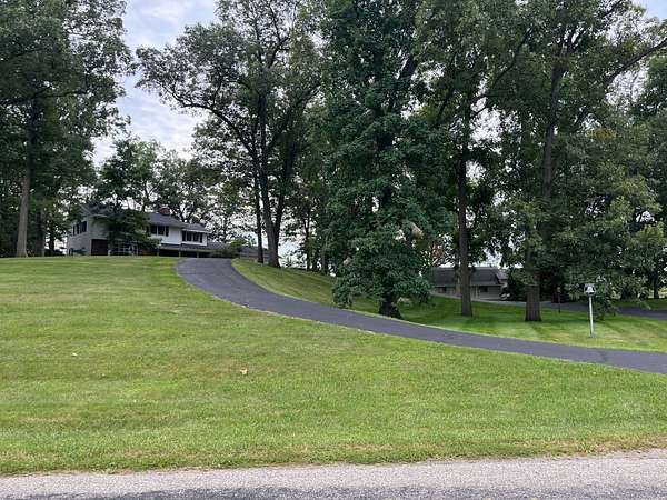 5.63 Acres of Residential Land with Home for Auction in Ligonier, Indiana