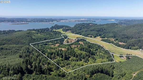 203 Acres of Agricultural Land with Home for Sale in North Bend, Oregon