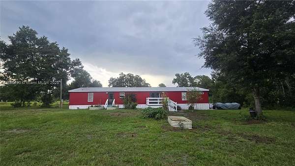 5.24 Acres of Residential Land with Home for Sale in Lakeland, Florida