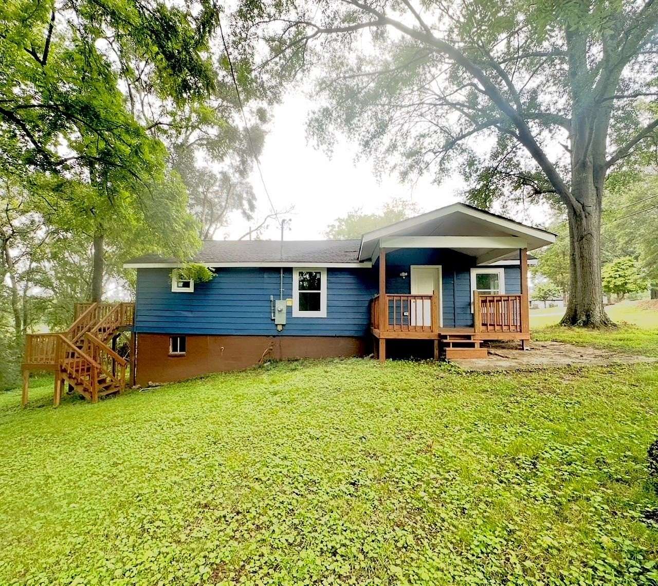 16.3 Acres of Land with Home for Sale in Tuscumbia, Alabama