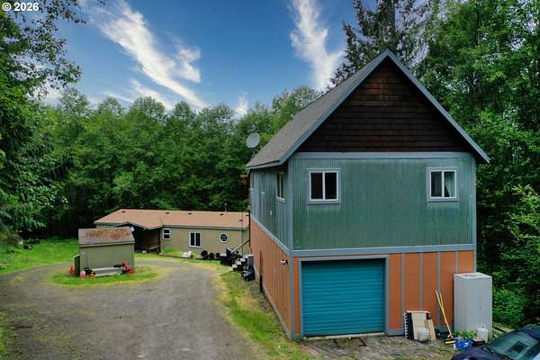 10.4 Acres of Land with Home for Sale in Rainier, Oregon