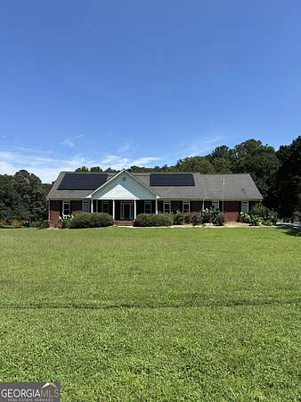 4.5 Acres of Residential Land with Home for Sale in Lawrenceville, Georgia
