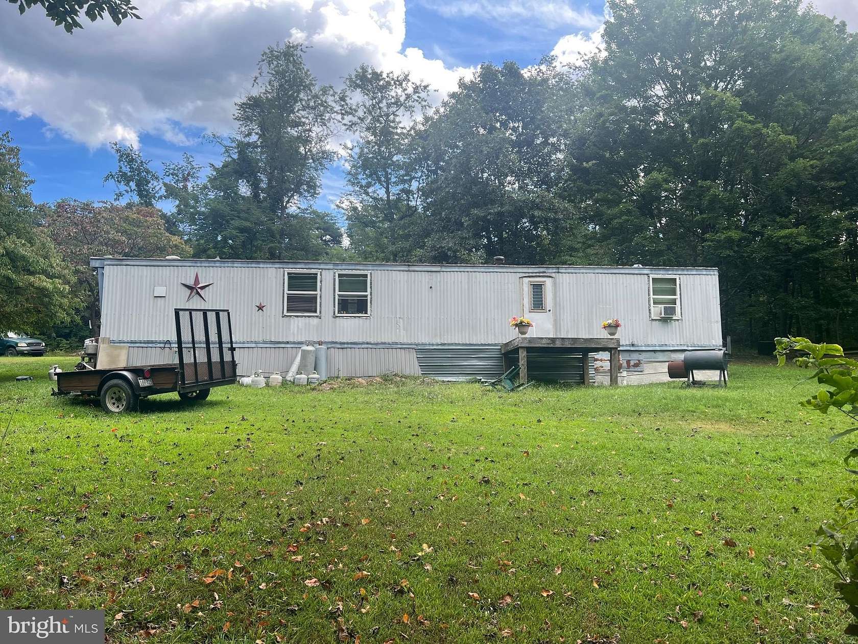 5.1 Acres of Residential Land with Home for Sale in Paw Paw, West Virginia