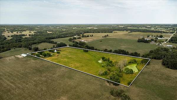 22.8 Acres of Land with Home for Sale in Bolivar, Missouri