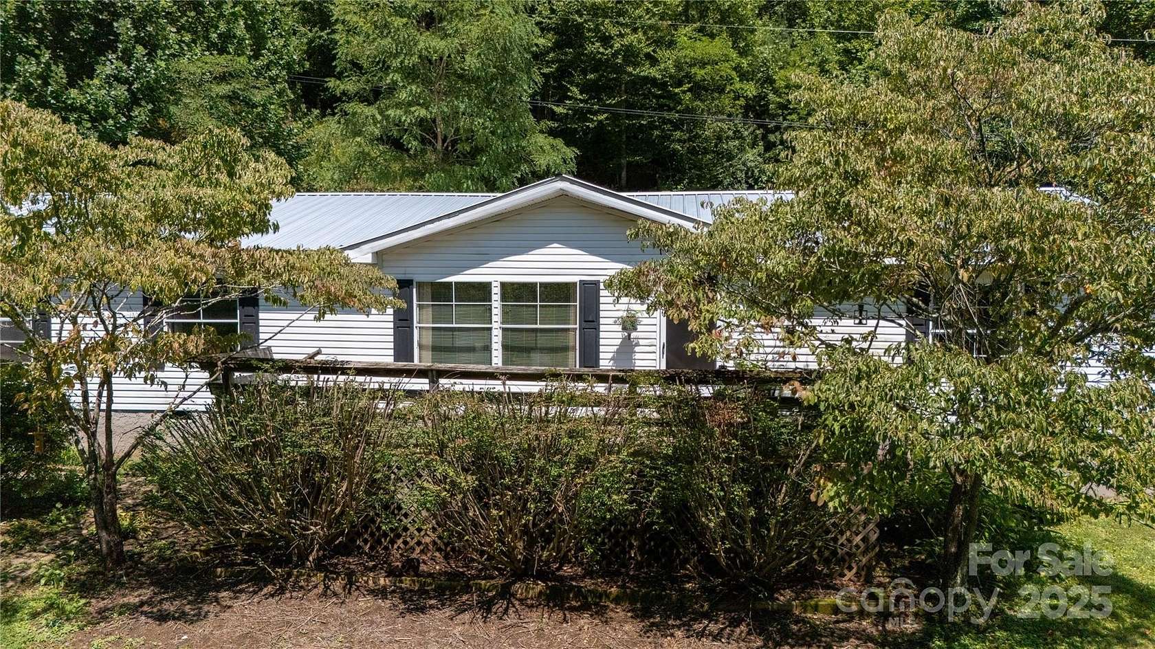 3.13 Acres of Residential Land with Home for Sale in Green Mountain, North Carolina