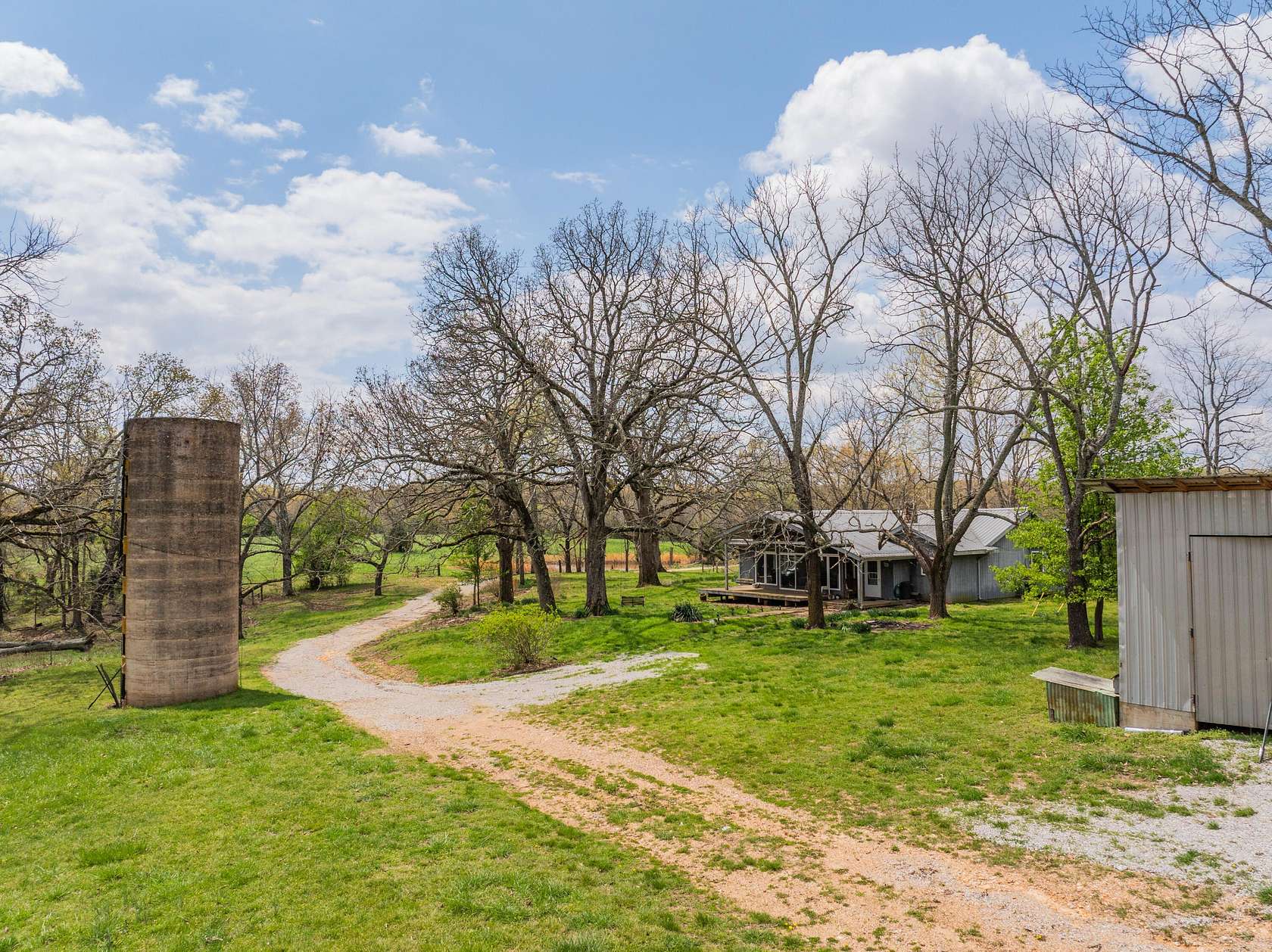 90 Acres of Agricultural Land with Home for Sale in Koshkonong, Missouri