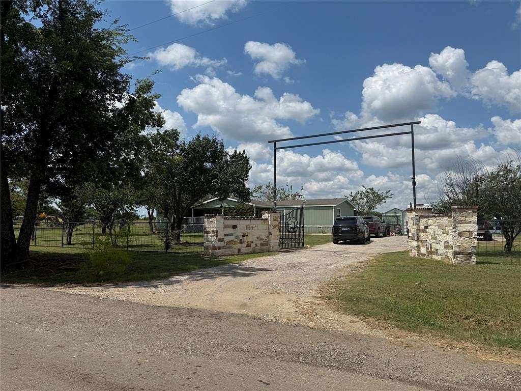 2 Acres of Residential Land with Home for Sale in Quinlan, Texas