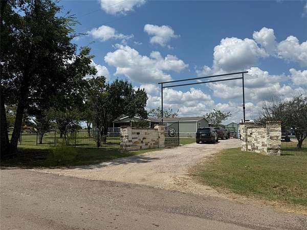 2 Acres of Residential Land with Home for Sale in Quinlan, Texas