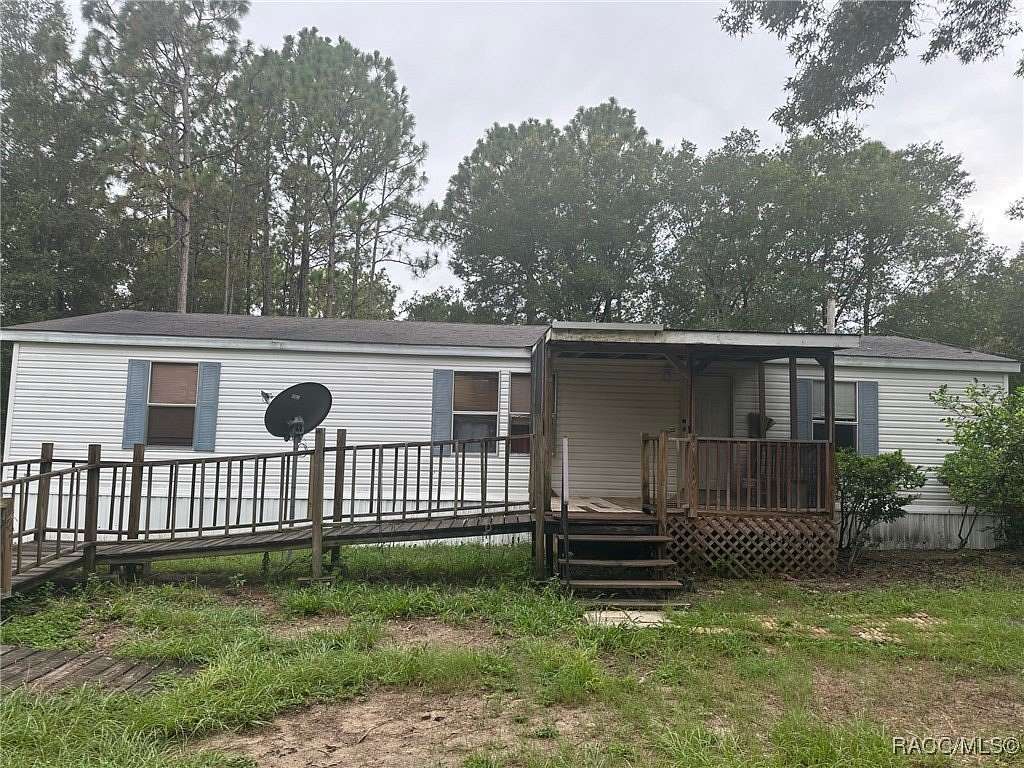 2.5 Acres of Residential Land with Home for Sale in Dunnellon, Florida