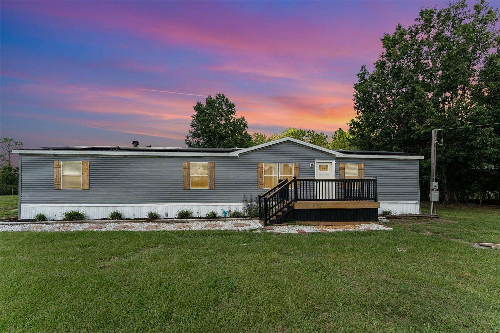 3.29 Acres of Residential Land with Home for Sale in Polk City, Florida