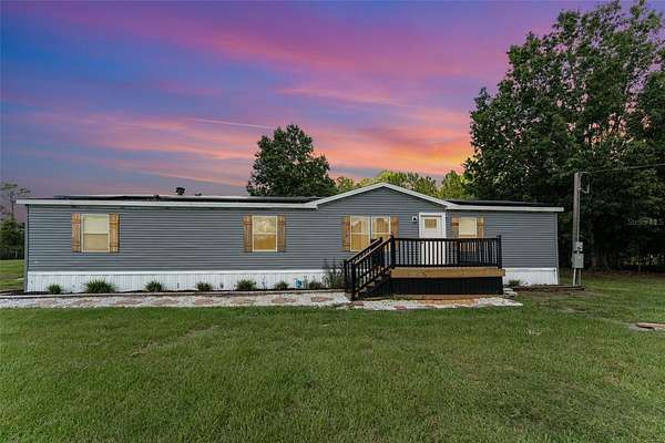 3.29 Acres of Residential Land with Home for Sale in Polk City, Florida