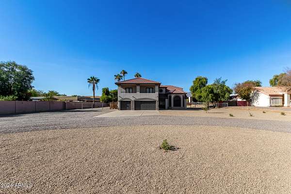 2 Acres of Residential Land with Home for Sale in Waddell, Arizona
