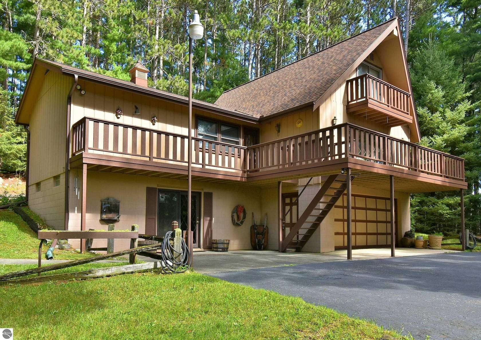 1.5 Acres of Residential Land with Home for Sale in Traverse City, Michigan