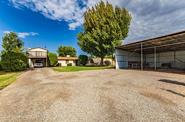 7.8 Acres of Land with Home for Sale in Aztec, New Mexico