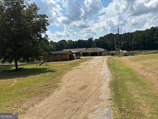 13.1 Acres of Land with Home for Sale in Covington, Georgia