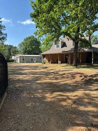 10 Acres of Residential Land with Home for Sale in Ben Wheeler, Texas