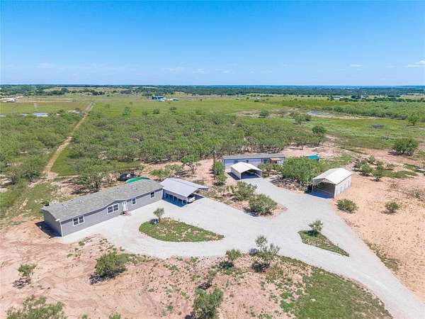 5 Acres of Residential Land with Home for Sale in Brookesmith, Texas