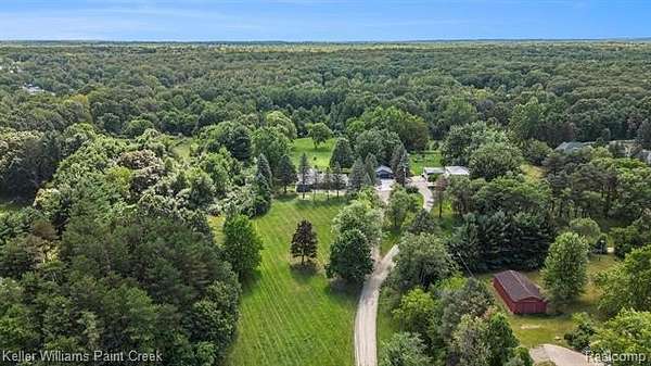 5.17 Acres of Residential Land with Home for Sale in Leonard, Michigan