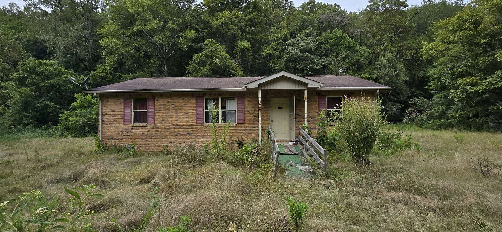 2.55 Acres of Residential Land with Home for Sale in McEwen, Tennessee