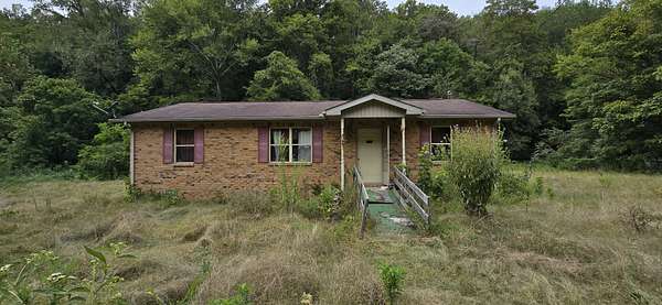 2.55 Acres of Residential Land with Home for Sale in McEwen, Tennessee