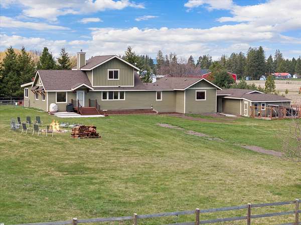 5 Acres of Residential Land with Home for Sale in Columbia Falls, Montana