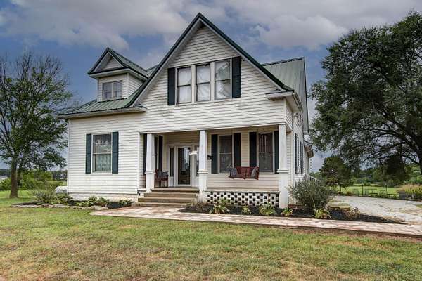 20 Acres of Agricultural Land with Home for Sale in Clever, Missouri