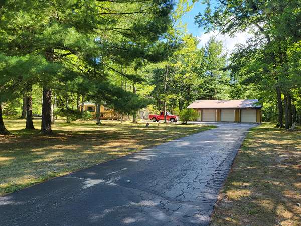 10 Acres of Residential Land with Home for Sale in Houghton Lake, Michigan