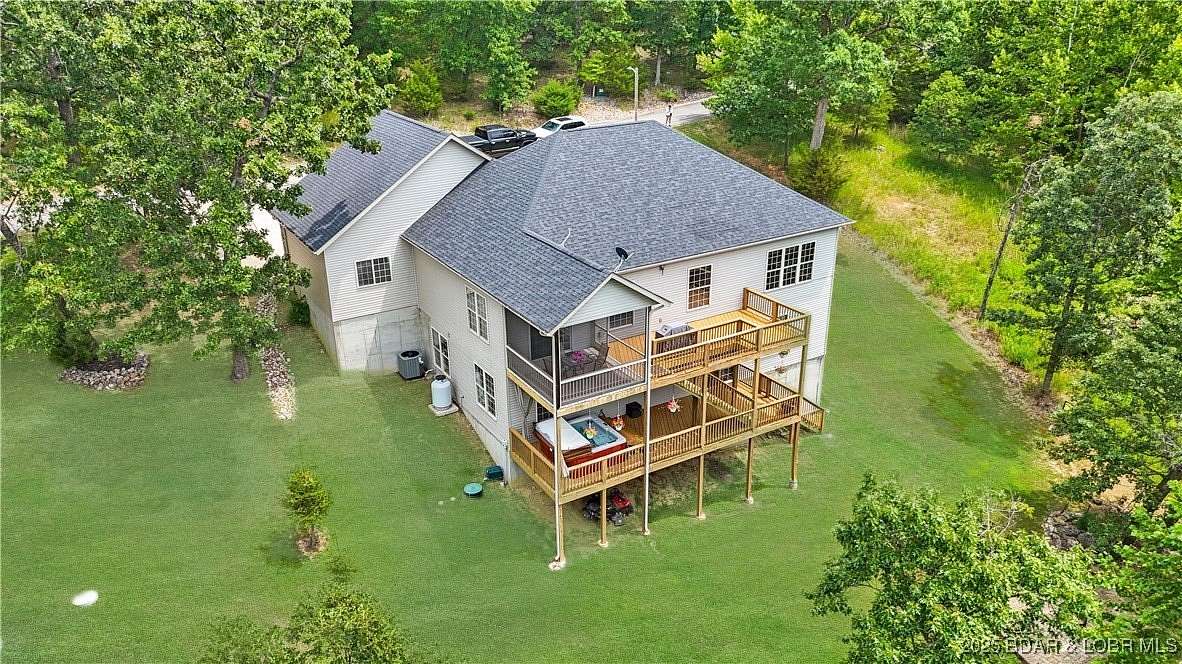 13.3 Acres of Recreational Land with Home for Sale in Camdenton, Missouri