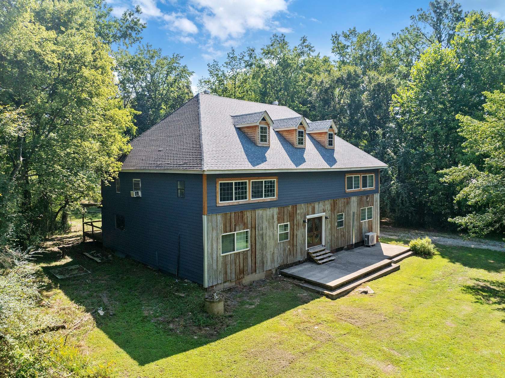 25.4 Acres of Land with Home for Sale in Parsons, Tennessee