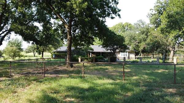 8 Acres of Residential Land with Home for Sale in Gainesville, Texas