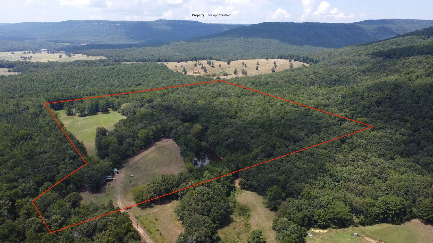 41.8 Acres of Recreational Land with Home for Sale in Clarksville, Arkansas
