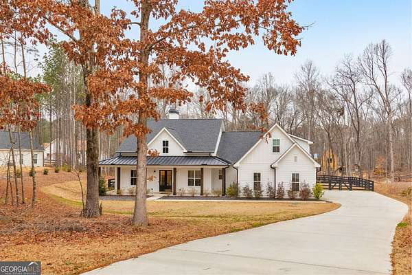 1.5 Acres of Residential Land with Home for Sale in Woodstock, Georgia