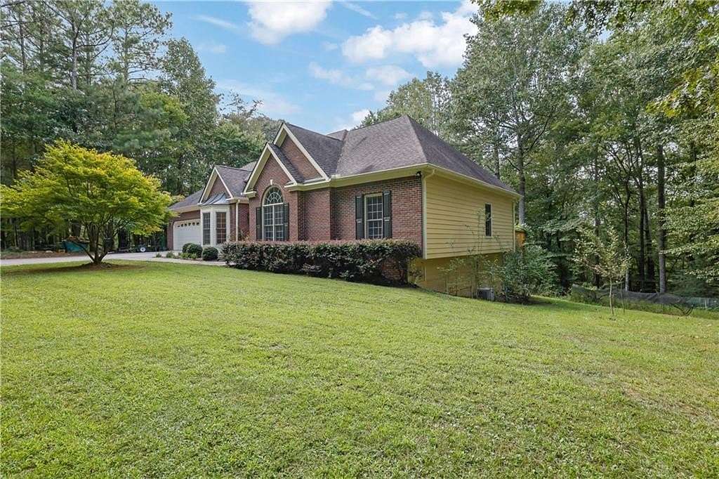 5.17 Acres of Residential Land with Home for Sale in Ball Ground, Georgia