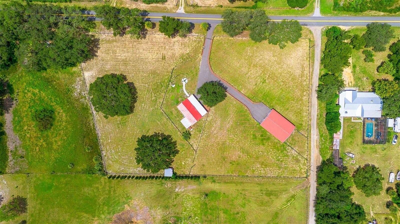 4.42 Acres of Residential Land with Home for Sale in Umatilla, Florida
