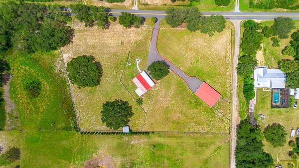 4.42 Acres of Residential Land with Home for Sale in Umatilla, Florida