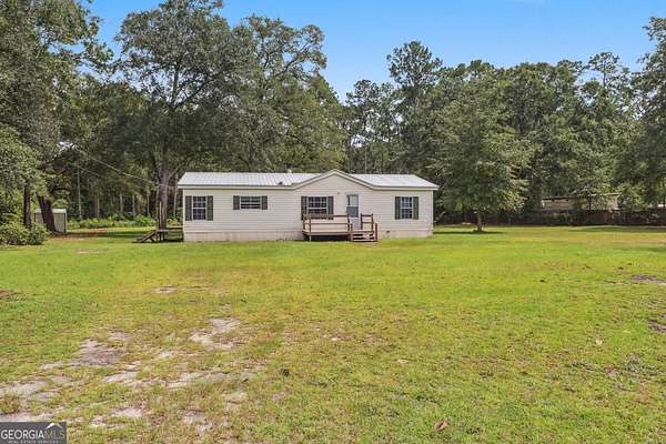 3.23 Acres of Residential Land with Home for Sale in Bloomingdale, Georgia